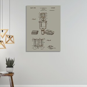 May include: A vintage black and white patent drawing of a microphone. The patent number is 2,113,219 and the date is April 8, 1938. The patent is for a microphone designed by H.F. Olson et al. and filed May 21, 1934.