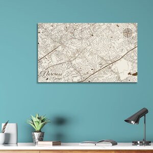 May include: A wood map of Norcross, Georgia, with brown lines and text. The map is on a white background and has a compass rose in the top right corner.