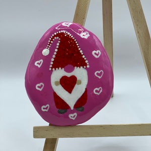 Little gnome holding heart, painted rock