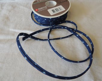 Spaghetti ribbon, fancy, Navy blue background with light blue stars (110), width 7 mm