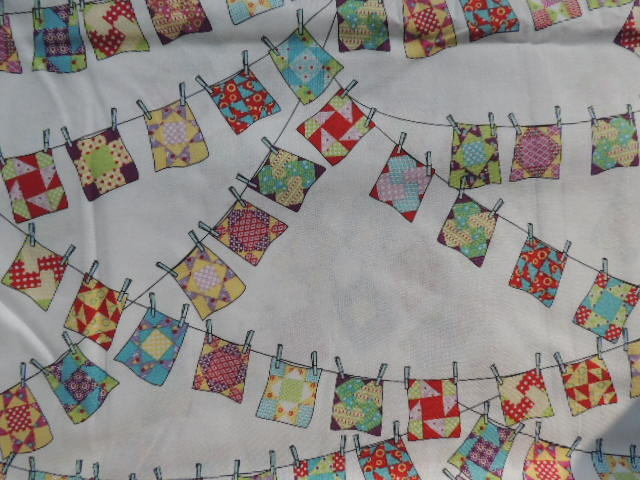Fabric patch Windham Fabrics thread pegs