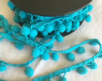 treccia pompon Colore blu turchese Larghezza 1 cm