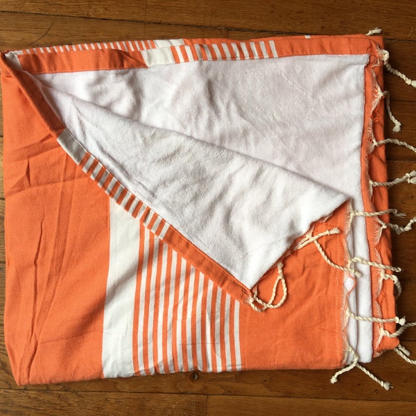 Fouta coton, doublée éponge, tons orange rayures blanches