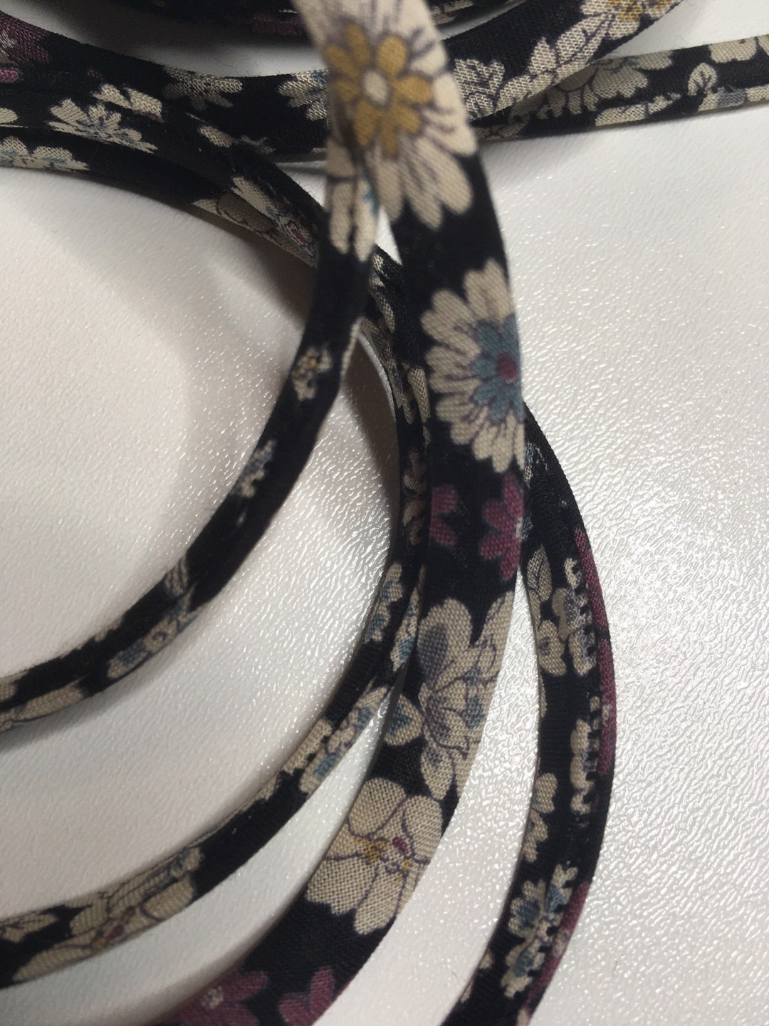 Spaghetti Ruby Ribbons Spaghetti Ribbon, Fancy, Black Background With Cream-colored Flowers (9 ...