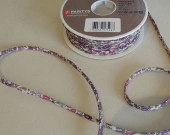 Fancy spaghetti ribbon white background with purple tone flowers (11)