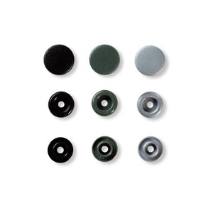 Peut inclure: Neuf boutons en plastique de trois couleurs : noir, vert foncé et argent. Les boutons sont disposés en trois rangées de trois.