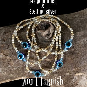 Evil eye beaded bracelet/14k gold and sterling silver /protection bracelet/ gold and silver evil eye/ evil eye jewelry/stretchy bracelet