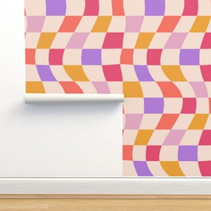 May include: A wallpaper design with a wavy checkered pattern in shades of orange, pink, purple, and red.