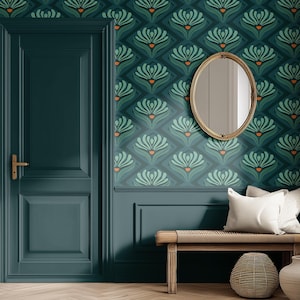 May include: Interior design featuring a teal door, matching wall paneling, and patterned wallpaper with a floral design. A gold-framed oval mirror hangs above a bench with pillows. A woven basket and a vase are also present.