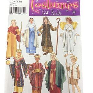 May include: A Simplicity sewing pattern envelope for Costumes for kids, number 4797, size A S,M,L. The front cover features illustrations of eight children wearing various historical and biblical-style costumes, including robes, tunics, crowns, and wings.
