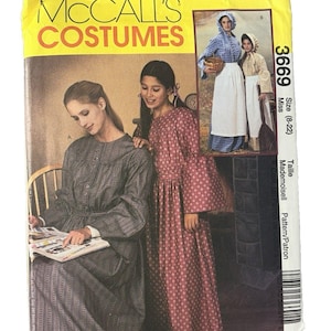May include: McCall's Costumes sewing pattern 3669 for sizes 8-22. The envelope features illustrations of long-sleeved dresses with gathered skirts and aprons in blue plaid and red floral patterns, including a bonnet and a basket accessory.