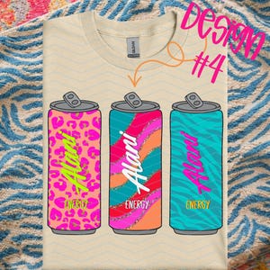 May include: Cream-colored t-shirt featuring three colorful energy drink can designs. Each can has a different pattern and color scheme, with the word "Alani" and "Energy" printed on them. The text "Design #4" is in the upper right corner.