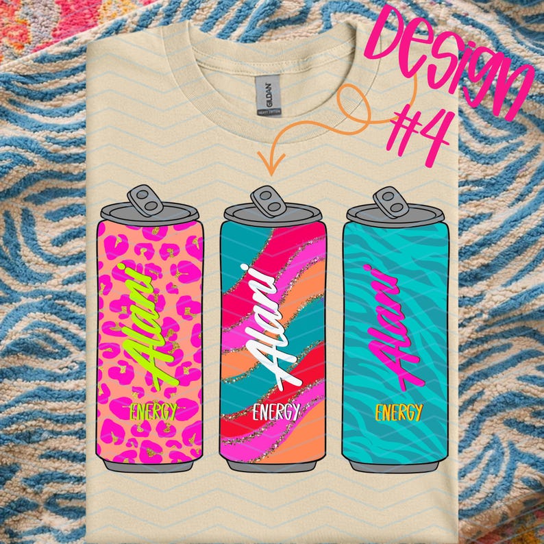 May include: Cream-colored t-shirt featuring three colorful energy drink can designs. Each can has a different pattern and color scheme, with the word "Alani" and "Energy" printed on them. The text "Design #4" is in the upper right corner.