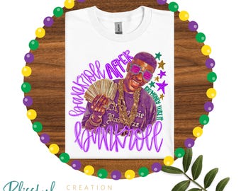 May include: White t-shirt featuring a graphic of a man wearing sunglasses and holding money. The shirt has the words "Bankroll After Bankroll" in a purple script. The image is surrounded by Mardi Gras beads.