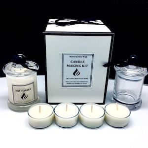 May include: A natural soy wax candle making kit with a white box, a glass jar with a lid, and four tea light candles. The box has the text "Natural Soy Wax Candle Making Kit" and "Let Your Creativity Shine".