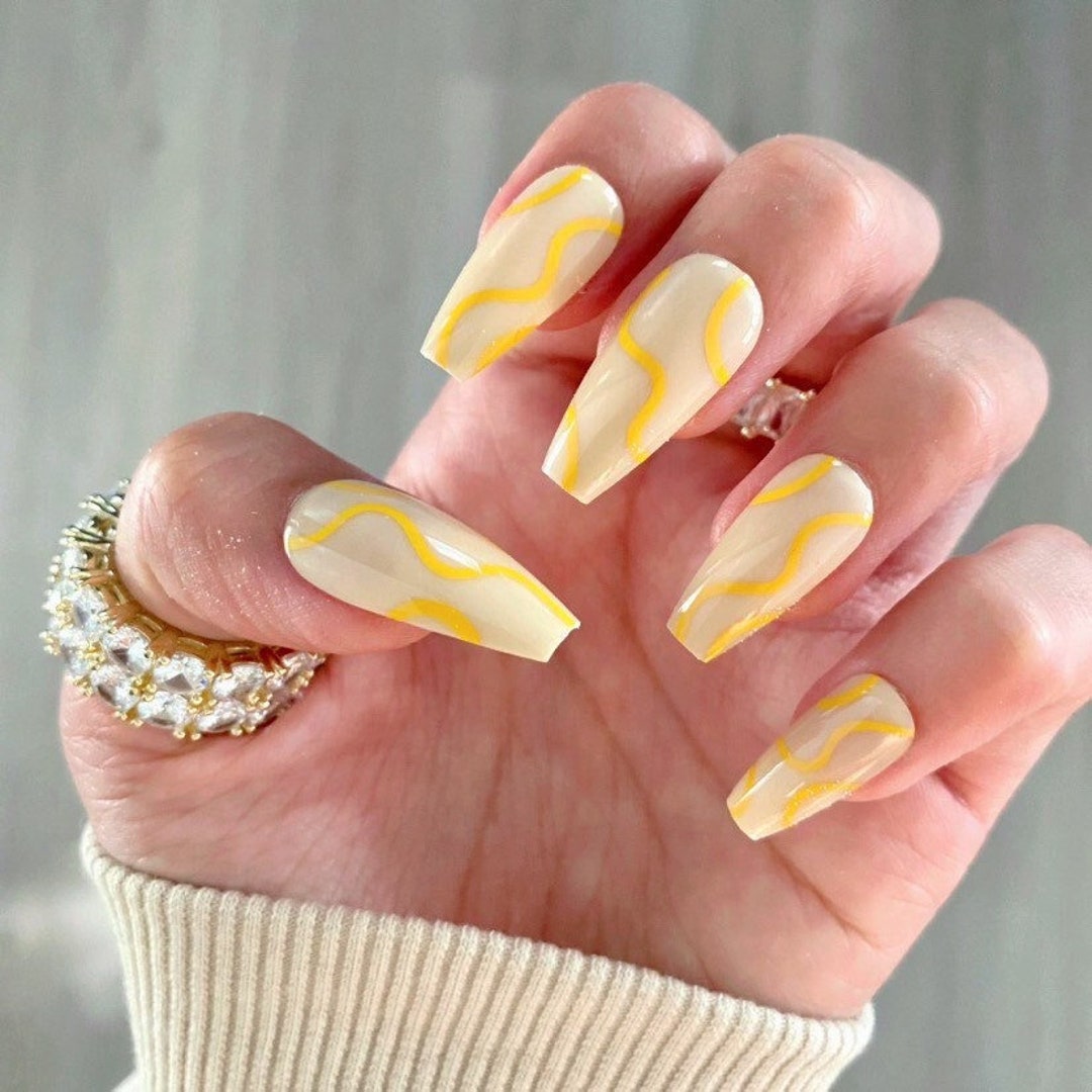Buy The NailzStation press on fake designer artificial nails extension (12  nails) with glue manicure kit for women (Yellow Floral) Online at Low  Prices in India - Amazon.in