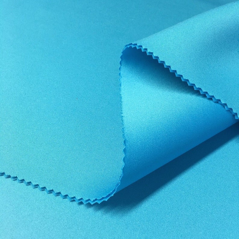 White Super Techno Neoprene Scuba Knit 4-way Stretch Fabric / 50 Yards Roll