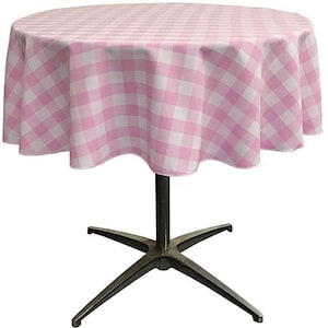 May include: A pink and white gingham tablecloth with a round shape. The tablecloth is draped over a round table with a black metal base.