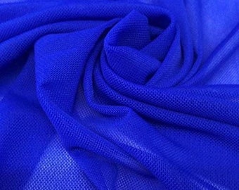 May include: Close-up of a vibrant blue fabric with a mesh-like texture. The material is gathered and folded, creating shadows and highlights that emphasize its flowing quality. The color is a rich, saturated blue, suggesting a lightweight textile.