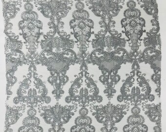 Damask Embroidery Design With Sequins On A Mesh Lace Fabric. Silver