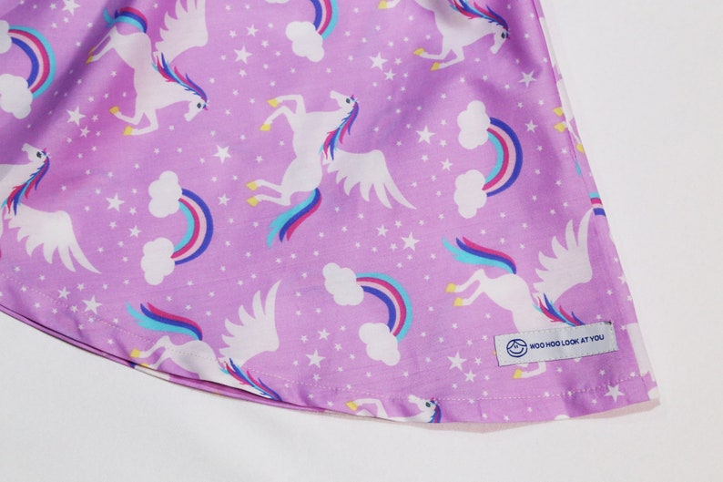 Exquisite Unicorn and rainbows on lilac background Dress