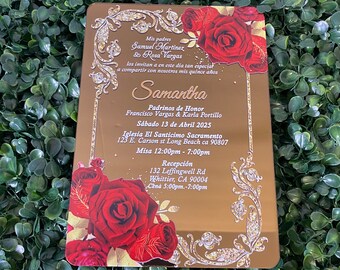 May include: A gold-colored invitation card with red roses and ornate gold accents. The card includes the name "Samantha" and event details in Spanish, including the date, time, and location of the quinceañera celebration.