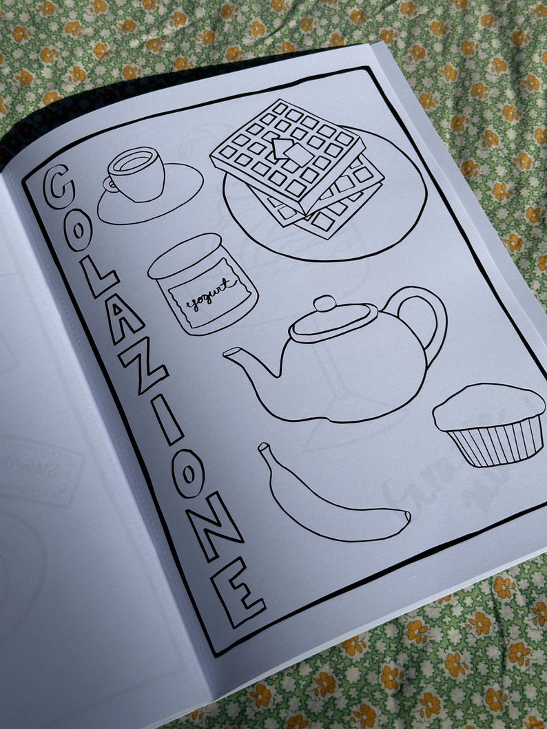 May include: Black and white line drawing of breakfast items on a page. Includes a cup of coffee, waffles, yogurt, a teapot, a banana, and a muffin. The word "COLAZIONE" is written vertically on the left side of the page.