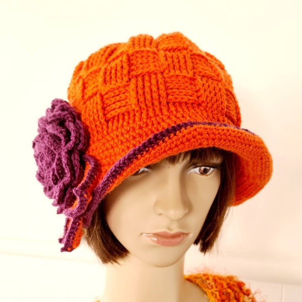 Cloche hat, winter crochet orange wool hat with large purple flower