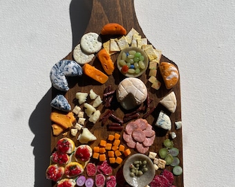 Miniature charcuterie board. Cool conversation piece!