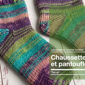 May include: Two pairs of colourful striped knitted socks, one pair is green, pink, and purple, the other is blue, green, and purple. The text on the image reads "Les bases au crochet tunisien Chaussettes et pantoufles 'Toe up'".