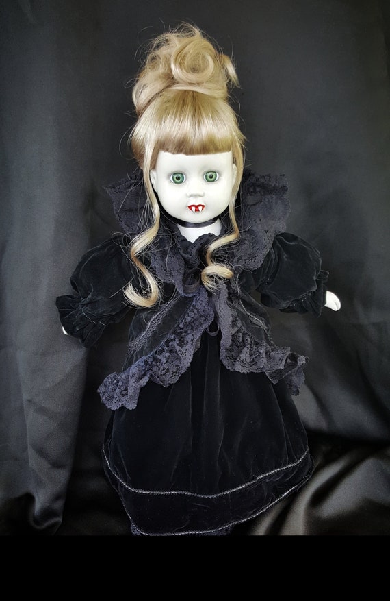 creepy vampire doll