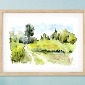 May include: Watercolor painting of a green landscape with a dirt path leading through a field. The path leads to a small pond with trees and bushes on either side.