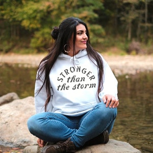Stronger than the Storm hoodies for women and men positive affirmations sweatshirts hoodies inspirational hoodie for girls weekend image 1