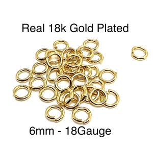 May include: A pile of 6mm gold-plated jump rings, 18 gauge. Real 18k Gold Plated.