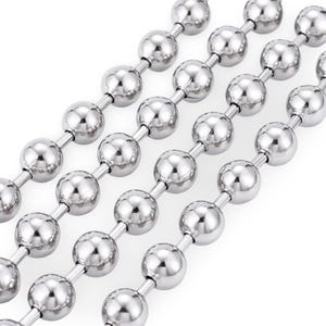 May include: Close-up of several strands of shiny, silver ball chain. Each chain is composed of evenly spaced, spherical beads connected by thin, straight metal links. The reflective surface of the beads creates a bright, metallic appearance. The chains are arranged diagonally.