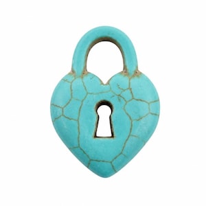 May include: A heart-shaped padlock charm in a bright turquoise color with a distinct brown crackle pattern throughout the surface. The padlock features a central keyhole opening and a rounded shackle at the top, presenting a smooth finish.