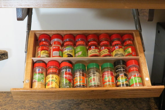 Drop down spice rack used as medicine organizer Or as a spice