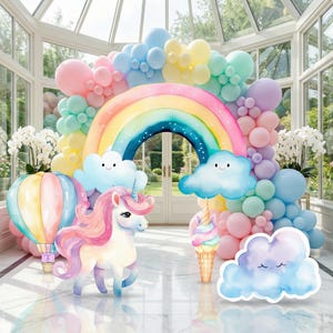May include: A decorative arch featuring a large rainbow, pastel-coloured balloon clusters, a white unicorn with a pink mane, a colourful hot air balloon, a soft-serve ice cream cone, and several smiling cloud cutouts in a bright, airy room.