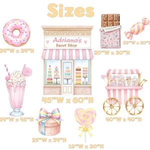 May include: A collection of sweet shop themed wall decals including a storefront labeled Adriana's Sweet Shop, a donut, a milkshake, a chocolate bar, a candy cart, a gift box, and a lollipop, with printed dimensions in inches for each item.