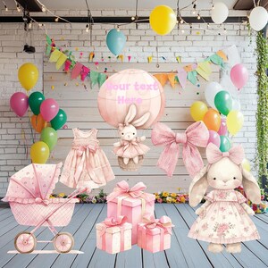 May include: Pink and white baby shower decorations with a hot air balloon, bunny, gifts, and a stroller. The balloon has the text "Your text here".