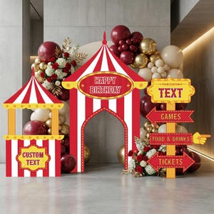 May include: A carnival-themed party display featuring a red and white striped tent arch with the text HAPPY BIRTHDAY, a smaller matching booth with CUSTOM TEXT, and a yellow signpost with arrows labeled YOUR CUSTOM TEXT, GAMES, FOOD & DRINKS, and TICKETS.
