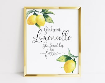 May include: A printable sign with a gold frame and lemons on a branch. The text reads "Grab your Limoncello She found her fellow".