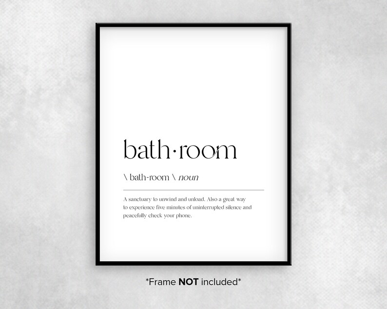 May include: Black and white printable wall art with the definition of the word "bathroom" as a sanctuary to unwind and unload. The text includes the phrase "Frame NOT included".