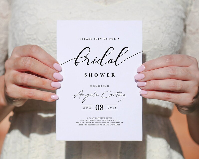 May include: A white bridal shower invitation with black text. The invitation reads "Please join us for a Bridal Shower honoring Angela Cortez, Aug 08, 2018. 2 PM at Britney's House, 133 4th Street, Santa Monica, CA 98254. RSVP to Crista at 000-000-0000 by September 10. Bride is registered at Crate and Barrel."