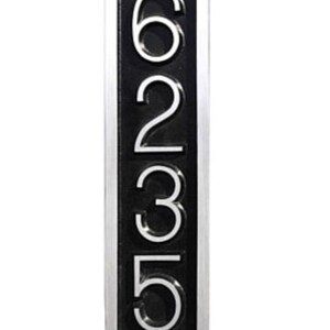 May include: A vertical silver-framed house number plaque with black background and white numbers 6235.