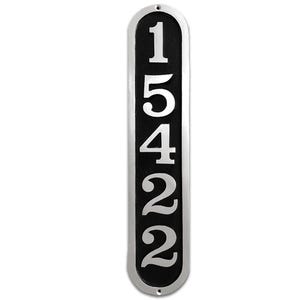 May include: A vertical silver house number plaque with black background. The numbers 15422 are displayed in a vertical format.