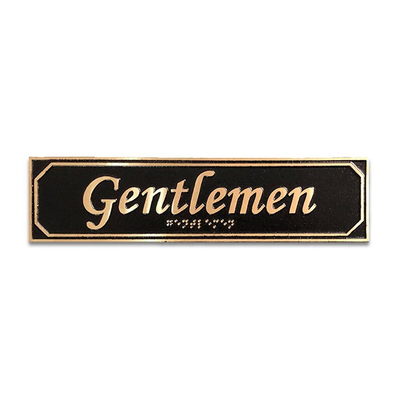 May include: A black rectangular sign with gold lettering that reads "Gentlemen".