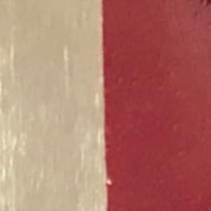 May include: A close-up of a beige and burgundy fabric with a subtle texture. The fabric is smooth and soft, with a slight sheen.