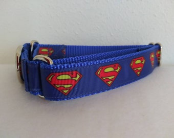 May include: A blue dog collar with a repeating pattern of red and yellow Superman logos.