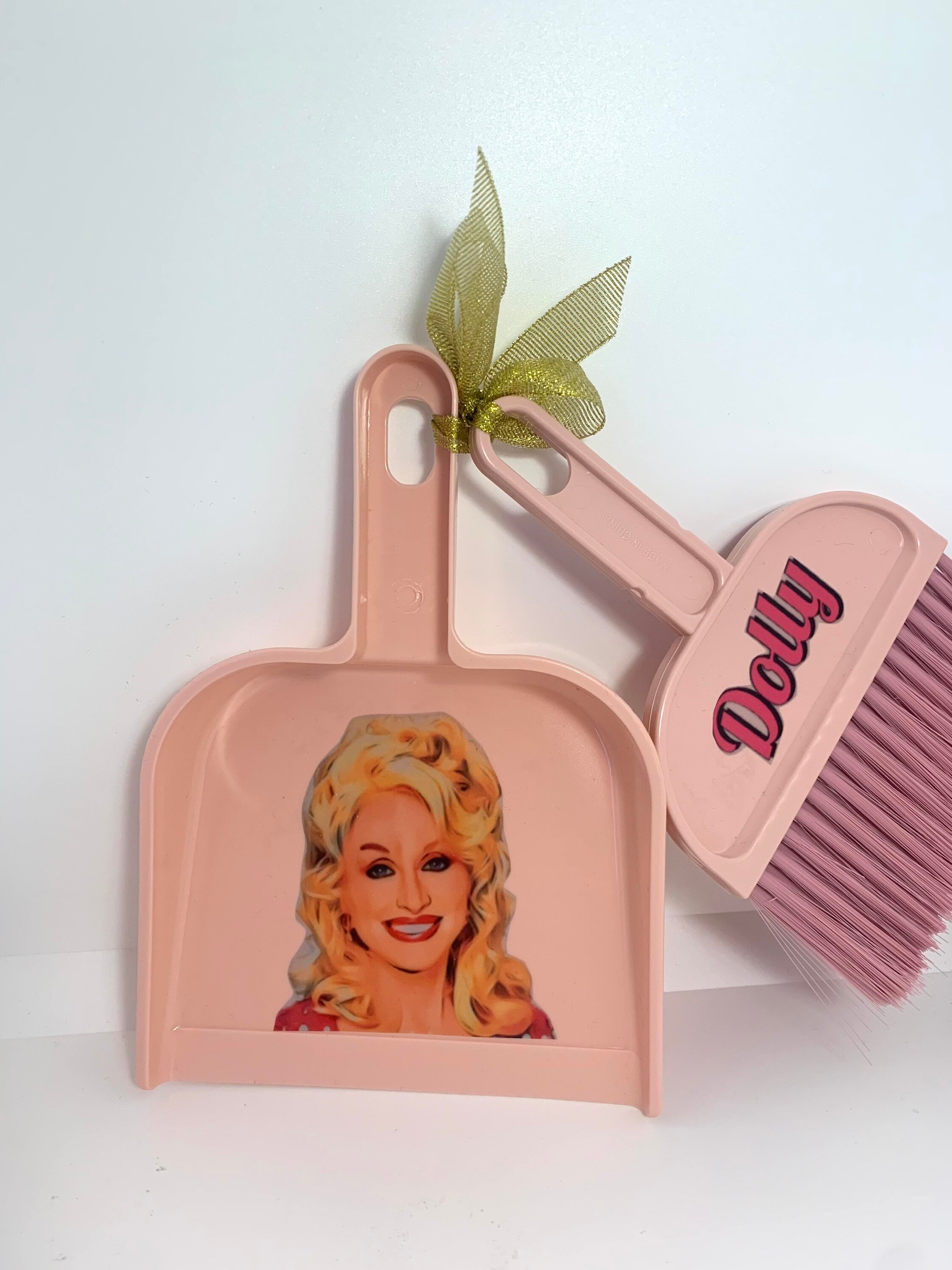 Dolly Parton dustpan and brush